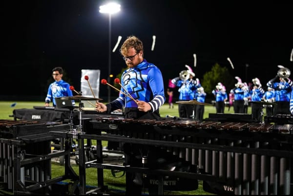 A photo of me playing the Marimba with the Bushwackers Drum and Bugle Corps