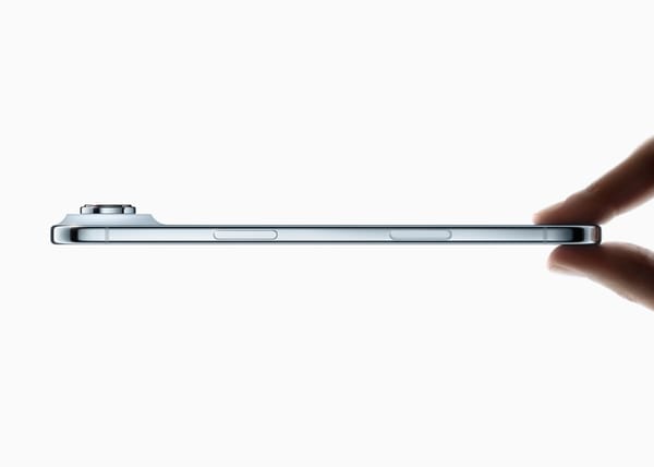 A Blue iPhone Air on a white background being pinched on the bottom of the phone/right of the image, showcasing its thinness